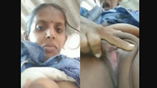 Tamil auntie flaunts her big tits and pussy on camera