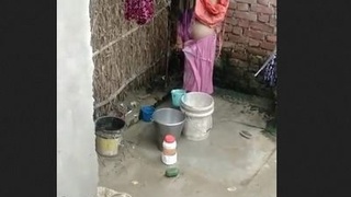 Desi bhabhi's outdoor bath in the open air