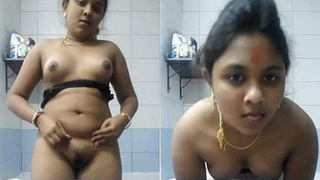 Watch a beautiful Desi wife strip down to nothing in a steamy striptease video
