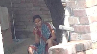 Desi girl flaunts her pussy in the village for neighbor's pleasure