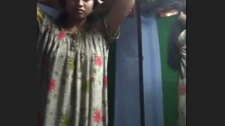 Busty Tamil girl in sexy outfit gets naughty on camera