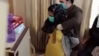 Doctor examines Pakistani woman's breasts by inserting his hands