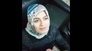Aunt in a hijab gives a blowjob and gets cum on her face