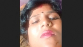 Desi housewife flaunts her big tits and curvy butt in village
