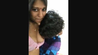 Indian girl with big breasts gives a sloppy blowjob to her partner