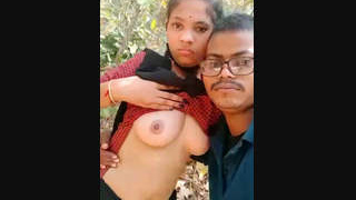 A couple from a village enjoys outdoor boob sucking in the sun
